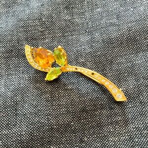 Gorgeous Nolan Miller Flower Crystal Goldtone Brooch